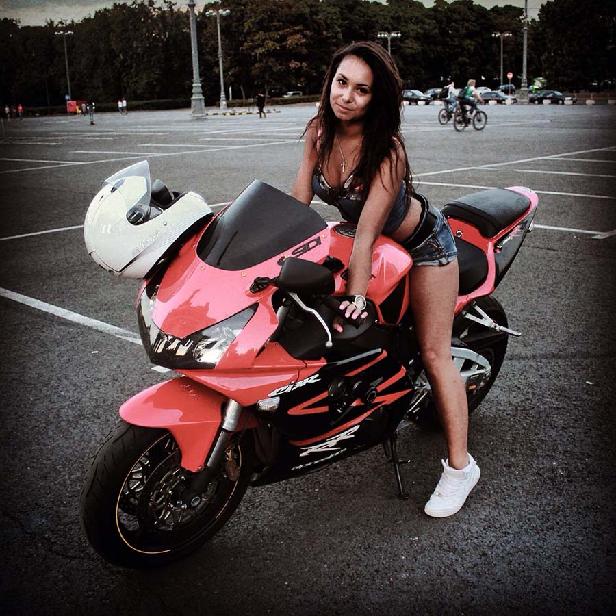 Brunettes on a motorcycle in Huh Hoto