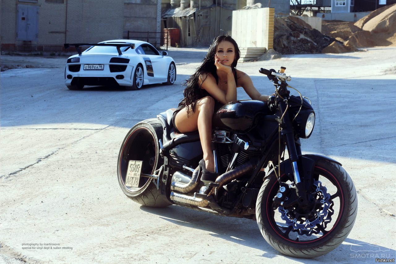 Sexy model Brunettes on a motorcycle in Huh Hoto